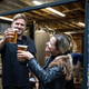 people toasting outside a bar